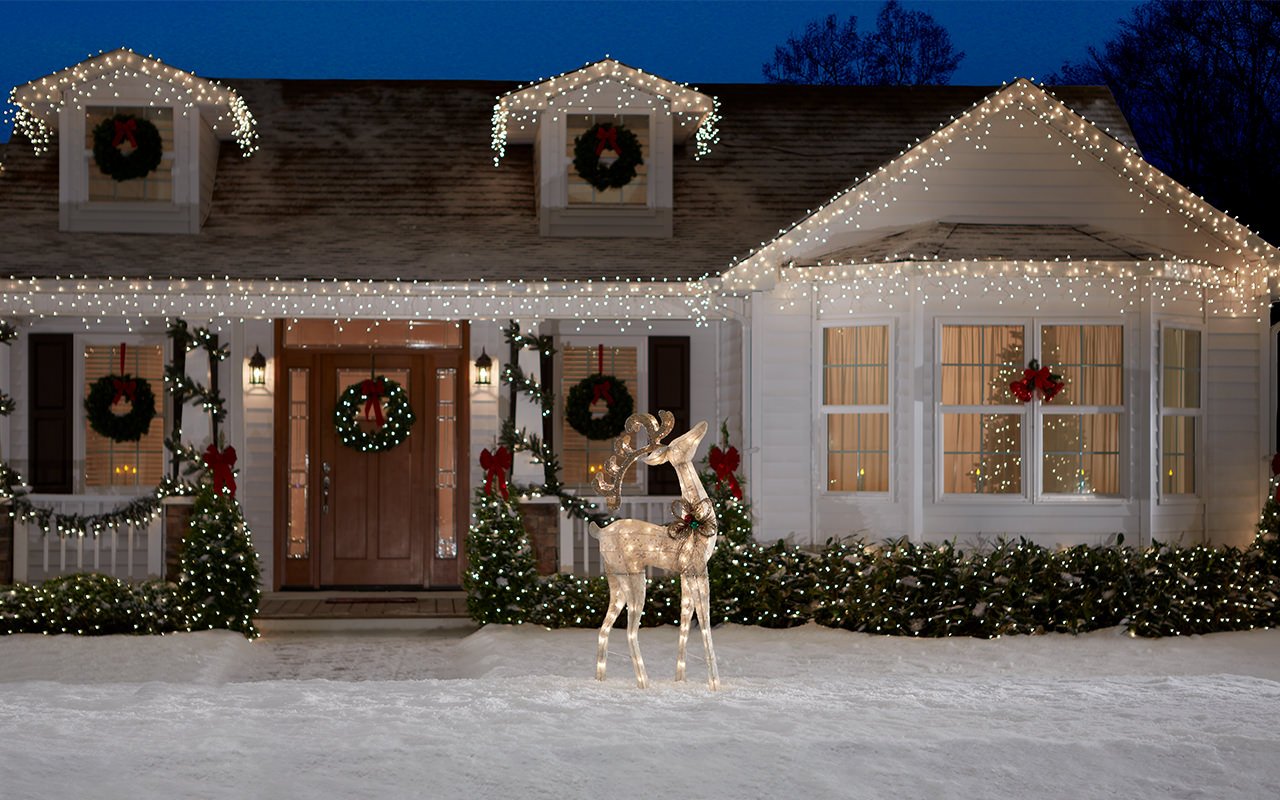 house-facade-in-studio-snow-deer-lights